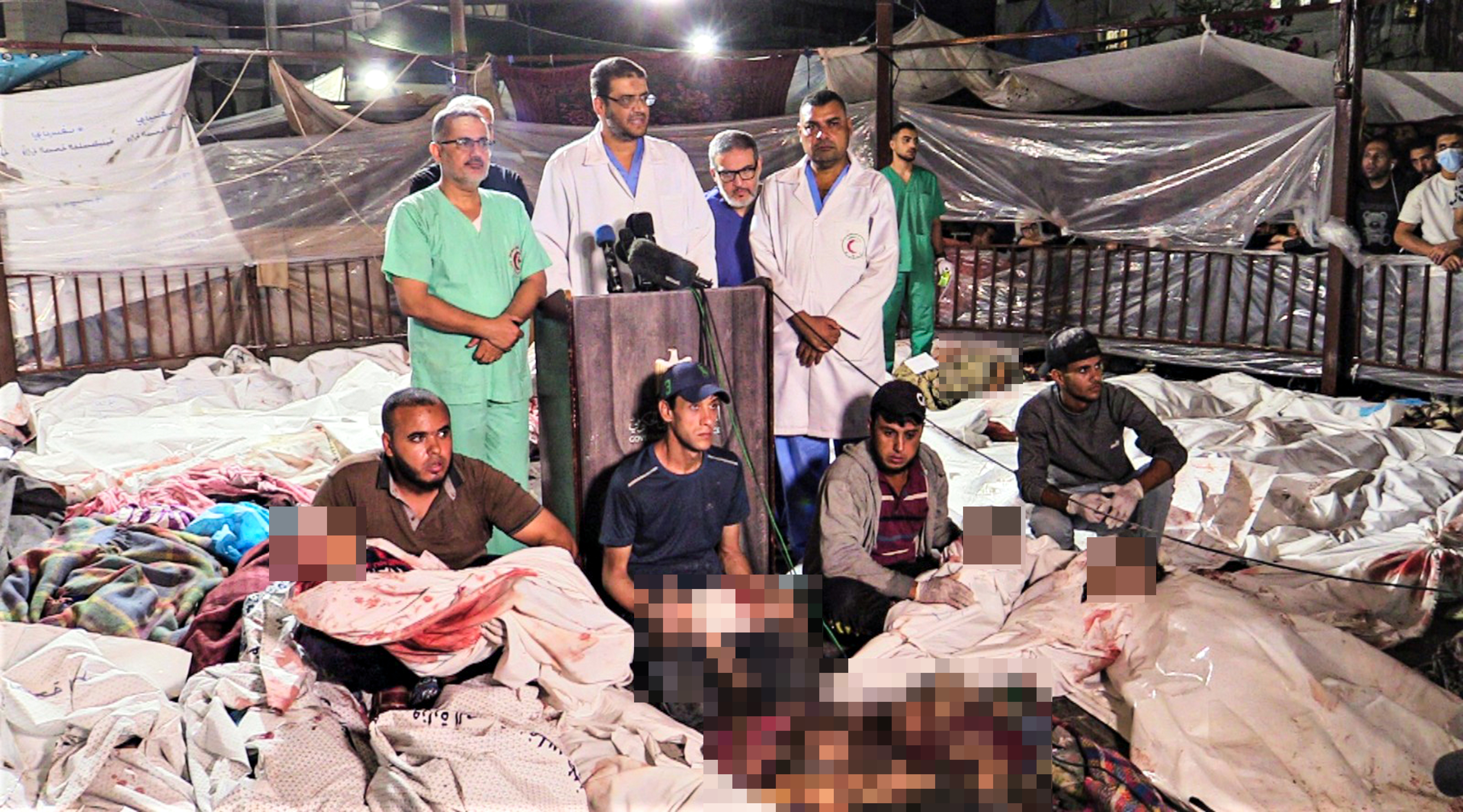 Horrified doctors surrounded by victims after the hospital blast