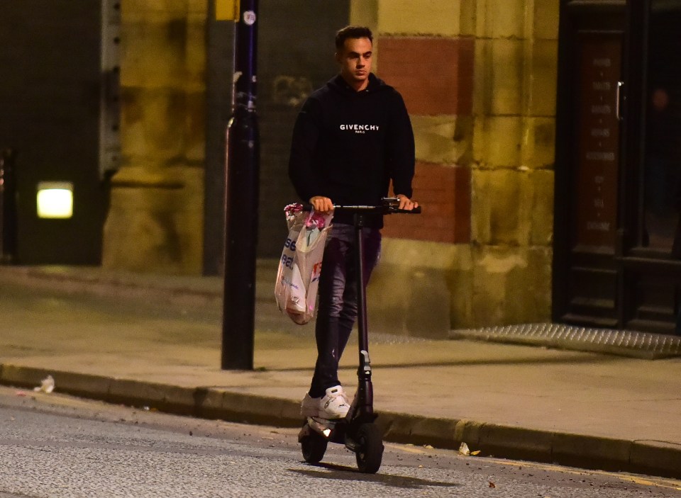 Sergio Reguilon was spotted carrying a bag full of flowers