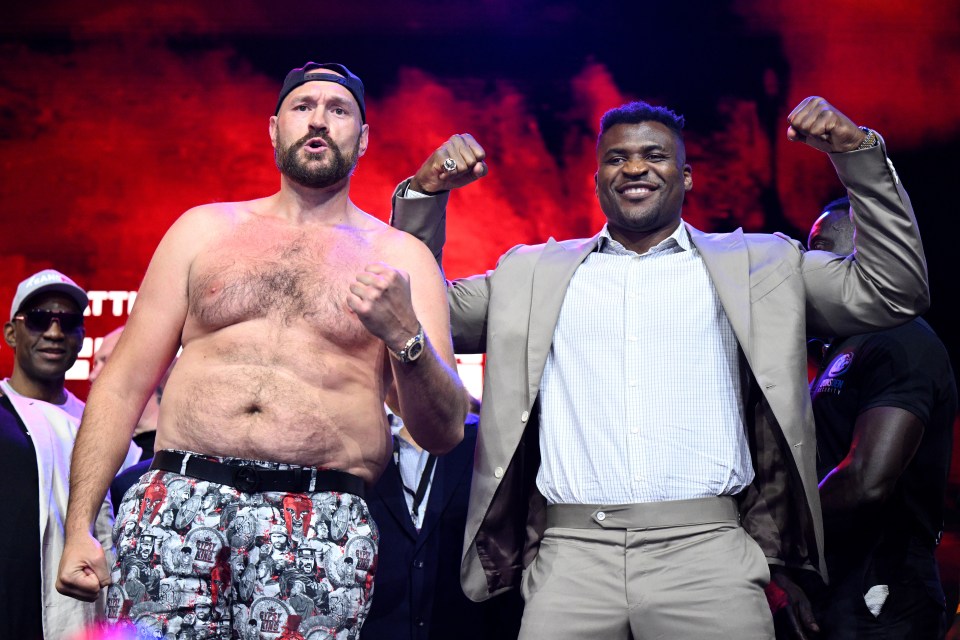 Tyson Fury facing off with Francis Ngannou