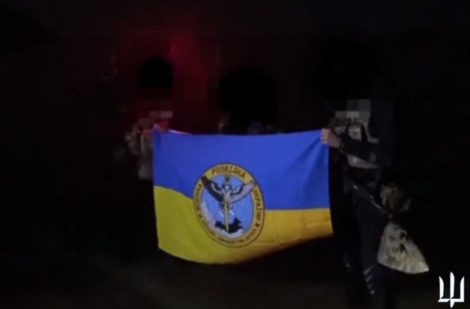 The extraordinary footage showed soldiers holding up a Ukrainian flag