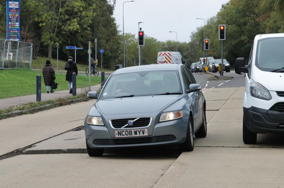 A Volvo clearly showing the issue with the uneven concrete road