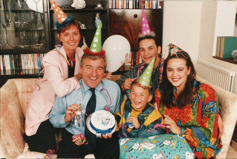 The couple at home with Terry's children