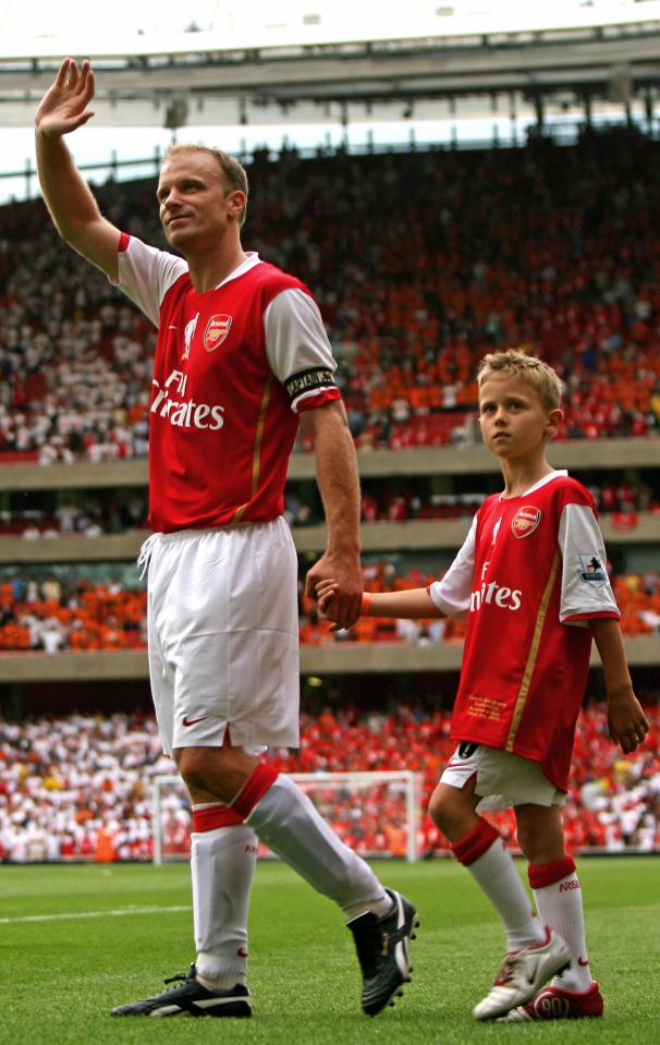 Dennis Bergkamp pictured with his son at his Arsenal testimonial match in 2006