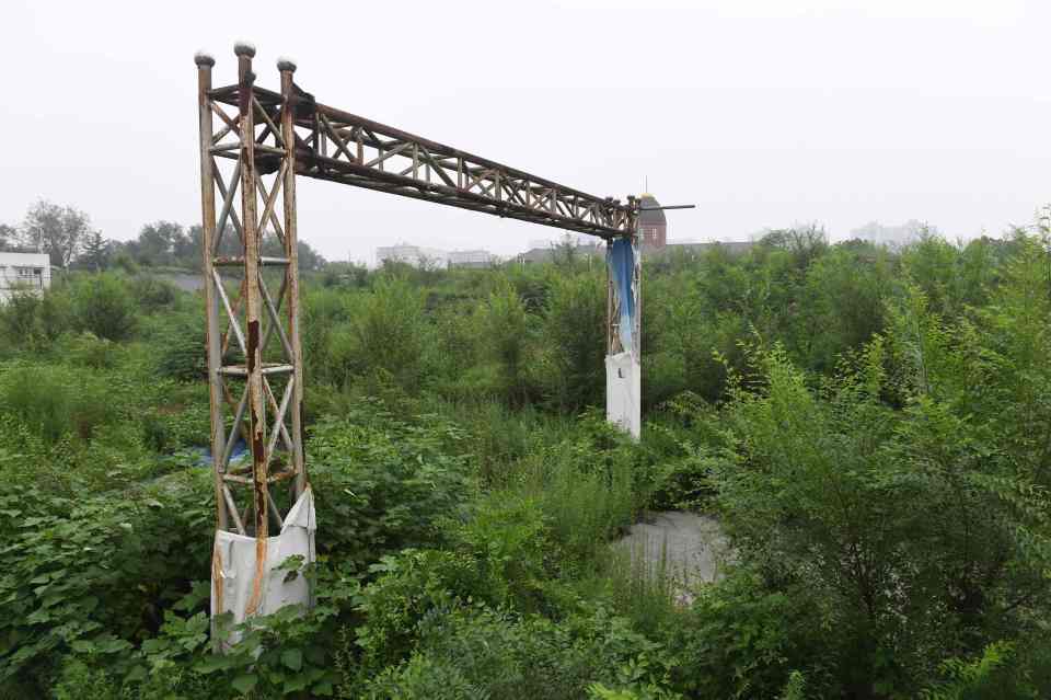 Eerie reminders of what once was, such as this frame at the BMX venue, remain visible