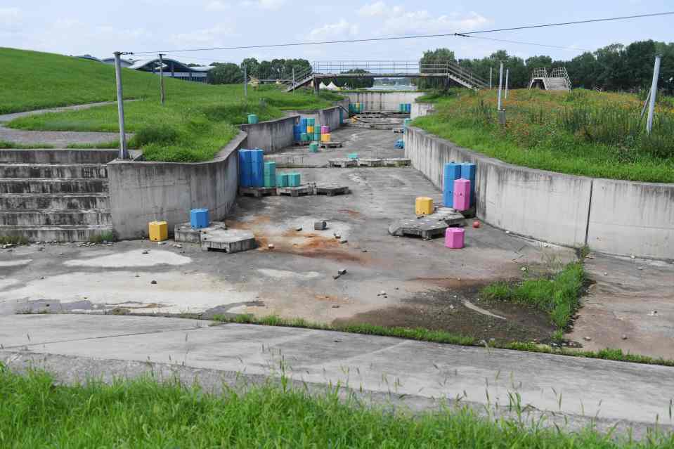 Small reminders that this concrete eyesore hosted the Olympics remain via the colourful floats left abandoned on the course