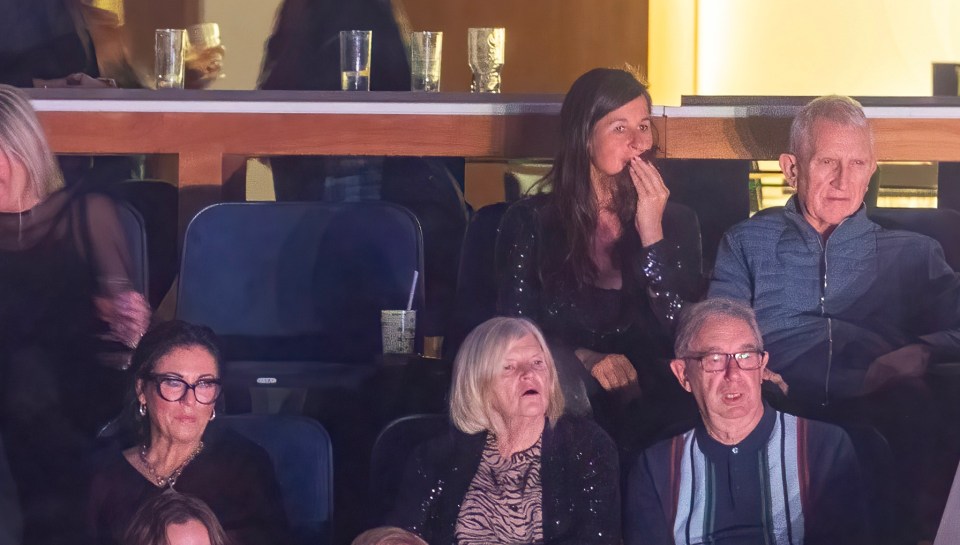 Jessie, front left, and Noye, far right on the back row, watch the Elvis Tribute act from a private box at London's O2 arena