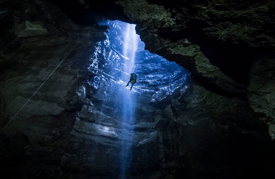 The winch lowers people 360ft down through the waterfall into the cavern