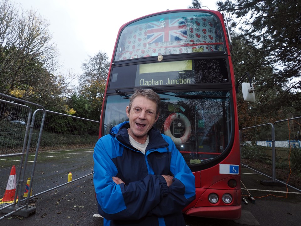 Gypsy Neil Wainwright calls a double-decker bus home - and loves it