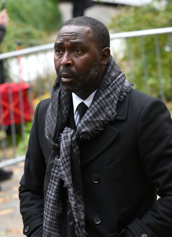 Former United striker Andy Cole attends the funeral today