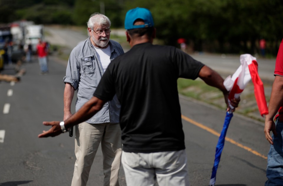 Darlington fired a handgun as he clashed with protesters blocking a major road