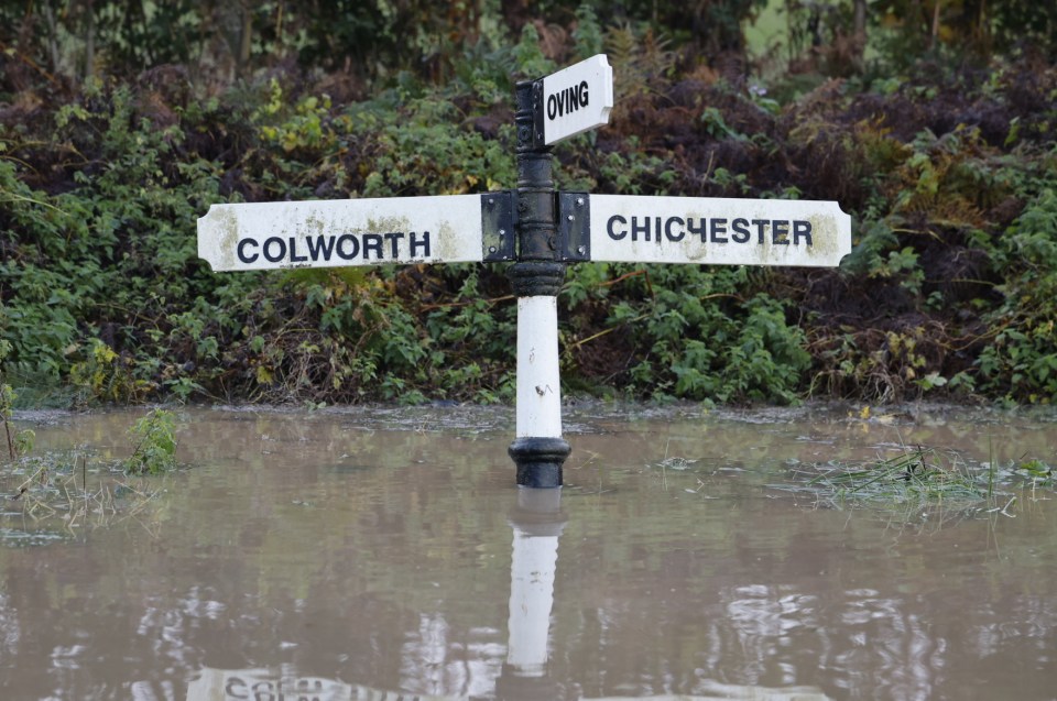 A submerged road sign near Bognor Regis in West Sussex