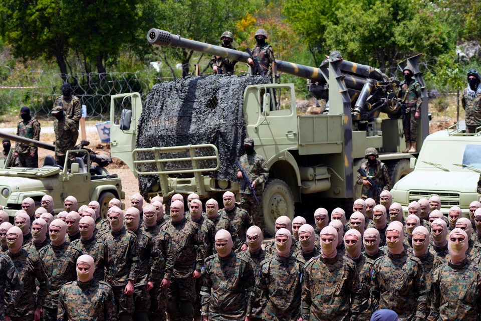 Hezbollah fighters carry out a training exercise in Aaramta village in the Jezzine District