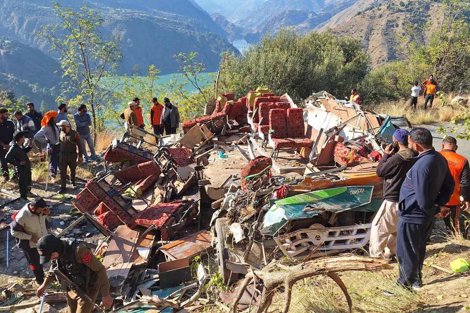 The bus was left completely mangled and destroyed as people were pulled out of the wreckage