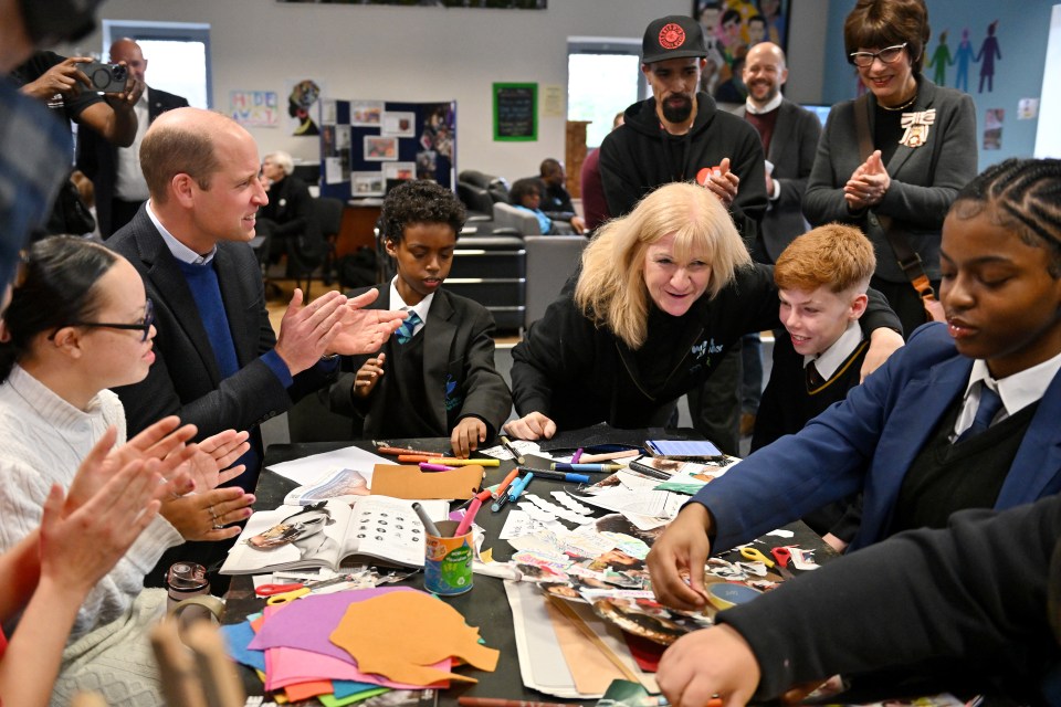 The future king spent time with the youngsters in Moss Side this morning