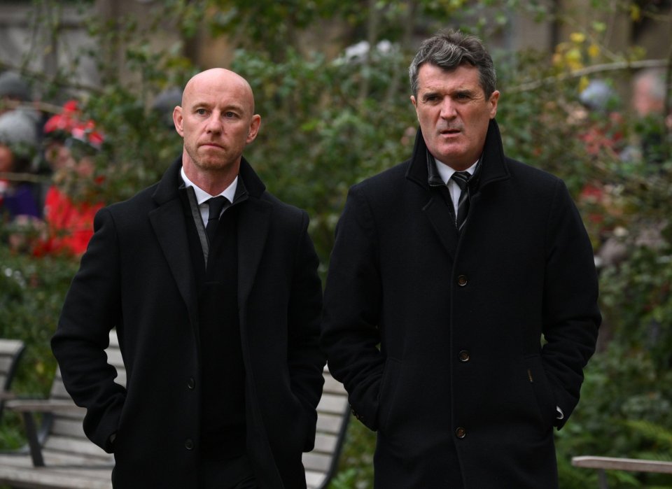 Nicky Butt (left) and Roy Keane (right) pictured outside Manchester Cathedral