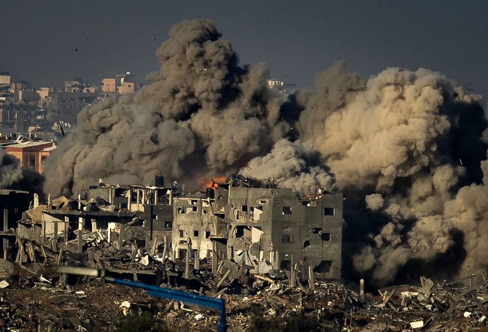 Huge clouds of dust and smoke soar above Gaza following recent Israeli strikes