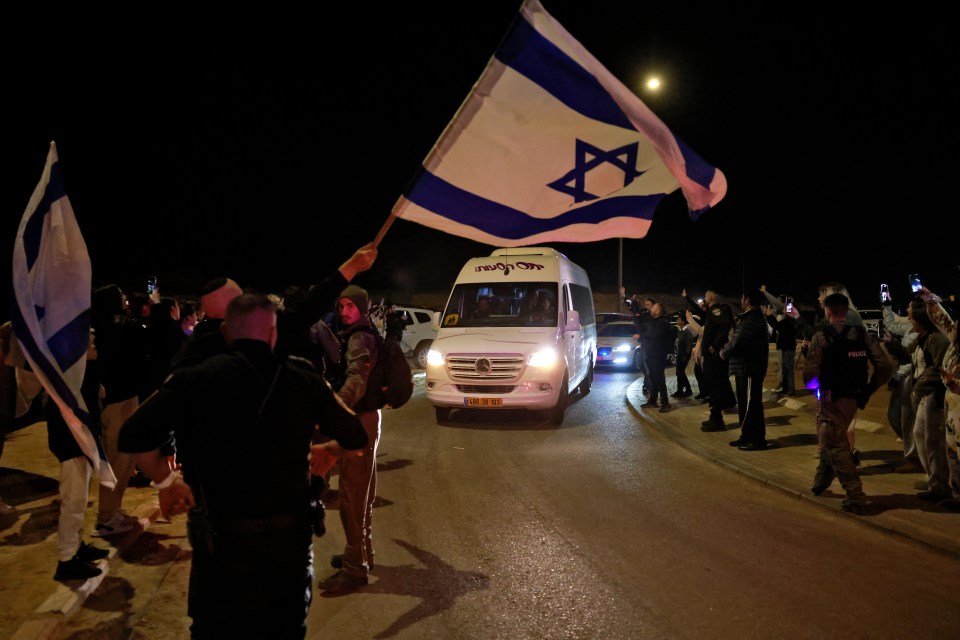 Two Russian hostages were released earlier and seen travelling past Israel flags