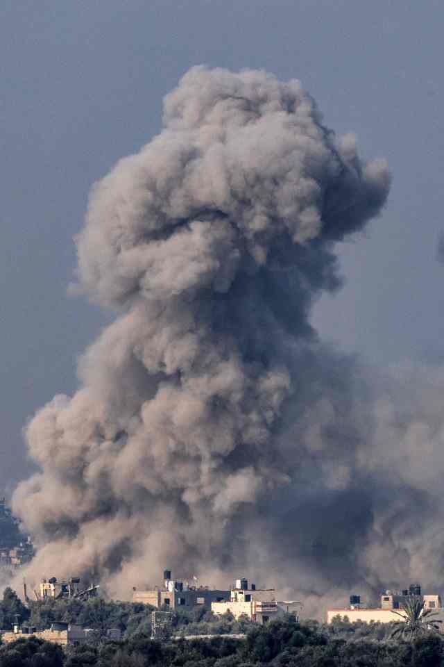 Smoke billowing in the air following bombardment in the south