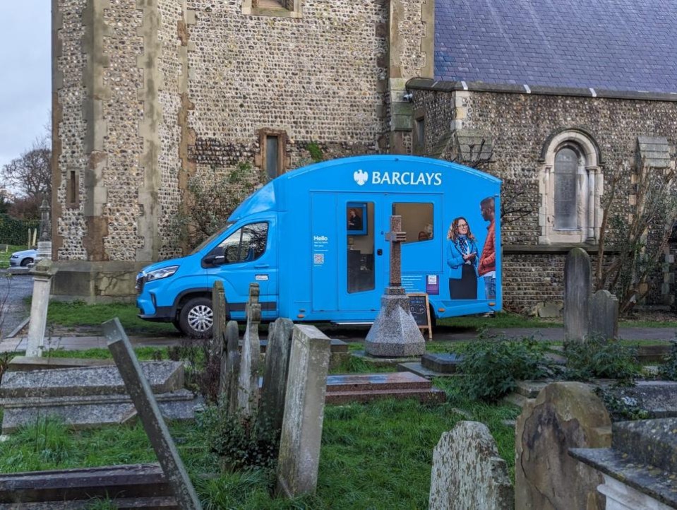 The Barclay's van in the cemetery at St Andrew's church, in Hove