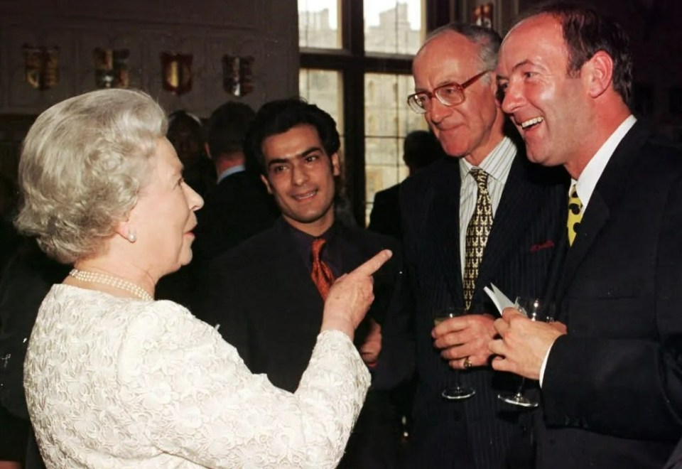 The late queen with Dean Sullivan during a reception at Windsor Castle