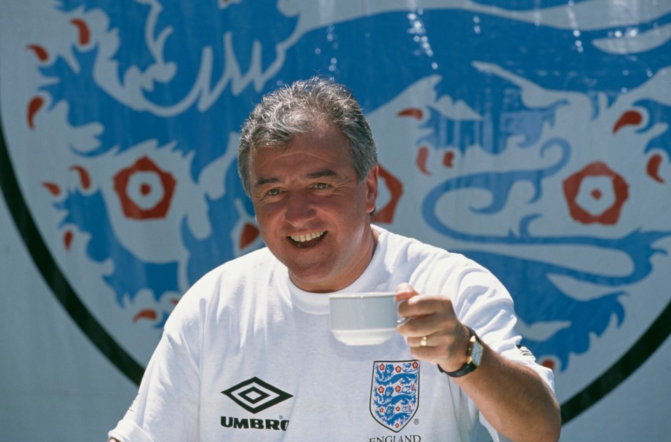 Manager Terry Venables holding a cup of tea at an England training session in 1996