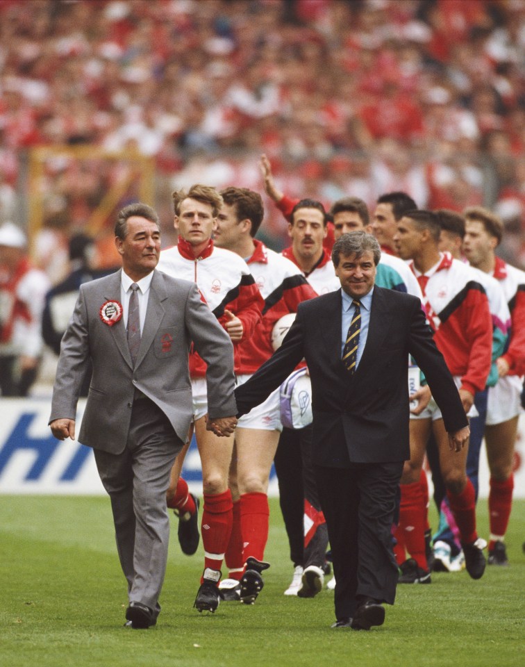 Then Tottenham Hotspur manager Terry Venables, right, with Nottingham Forest manager Brian Clough leading the teams out hand in hand before the 1991 FA Cup Final