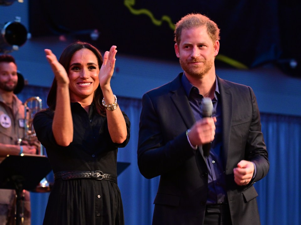 Author Scobie, a close friend of Harry and Meghan, pictured, claimed Kate was used for 'grinning photo-opportunities'