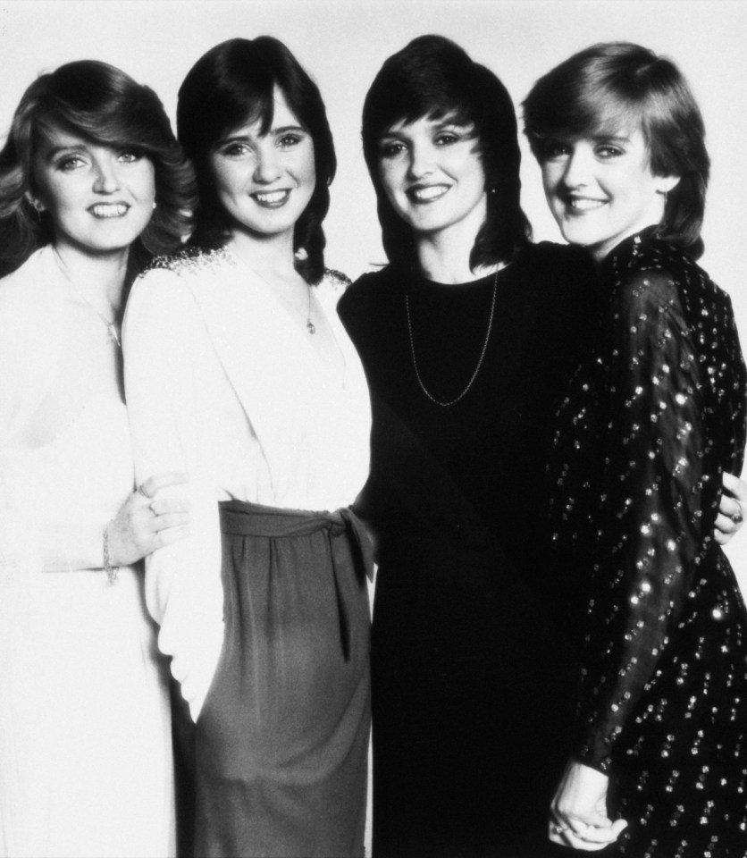 Black and white group portrait of the Nolans.