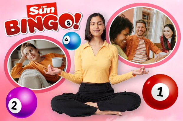 a woman sits in a lotus position surrounded by bingo balls