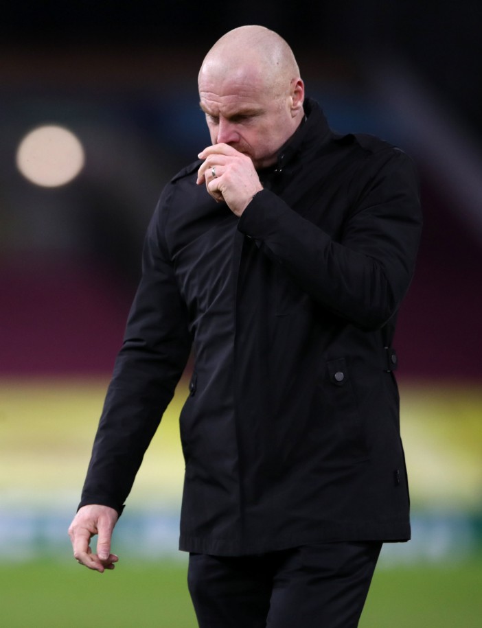 Burnley manager Sean Dyche walks off dejected after the final whistle, after the Emirates FA Cup fifth round match at Turf Moor, Burnley. Picture date: Tuesday February 9, 2021. PA Photo. See PA story SOCCER Burnley. Photo credit should read: Nick Potts/PA Wire. RESTRICTIONS: EDITORIAL USE ONLY No use with unauthorised audio, video, data, fixture lists, club/league logos or "live" services. Online in-match use limited to 120 images, no video emulation. No use in betting, games or single club/league/player publications.