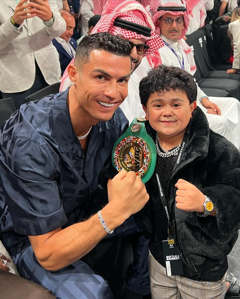 Football superstar Cristiano Ronaldo is all smiles with Abdu Rozik