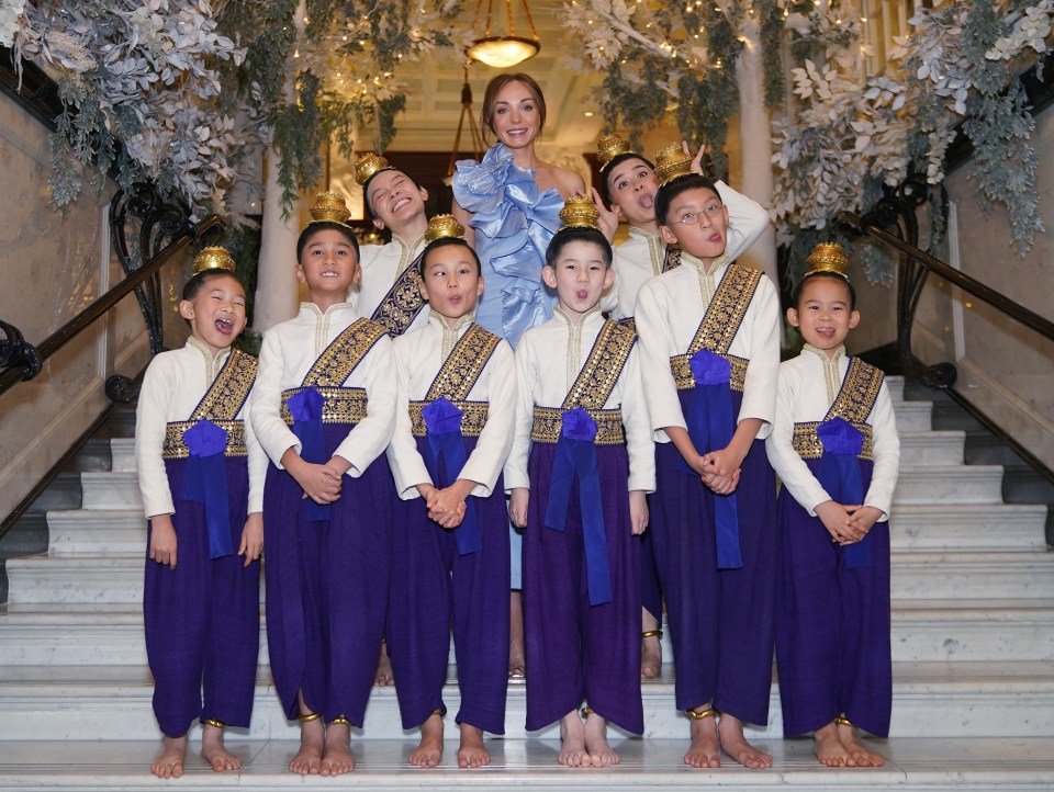 Helen dazzled in a sky-blue gown as she was joined by the young cast for a photocall at the Savoy hotel