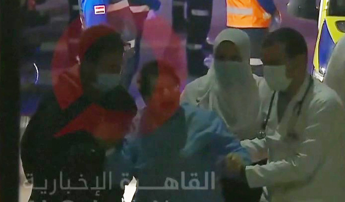 Red Cross medical staff were seen helping the released hostages