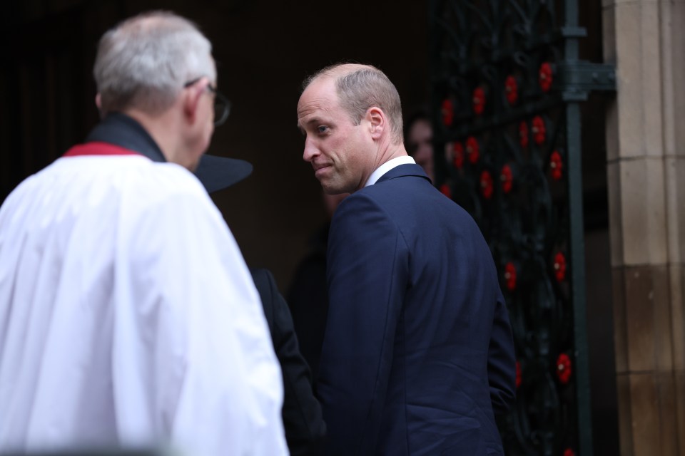 Prince William walking inside Manchester Cathedral for the service