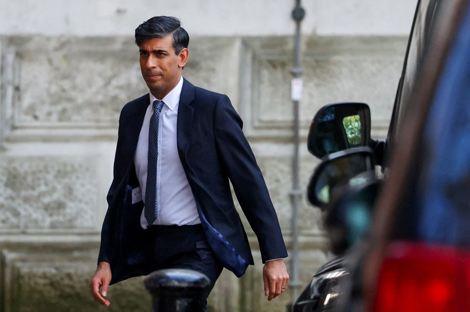 Rishi Sunak walks outside No10 as his major reshuffle rolls on