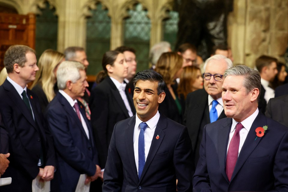 Prime Minister Rishi Sunak and Labour Party Leader Keir Starmer walk into the House of Lords for the speech