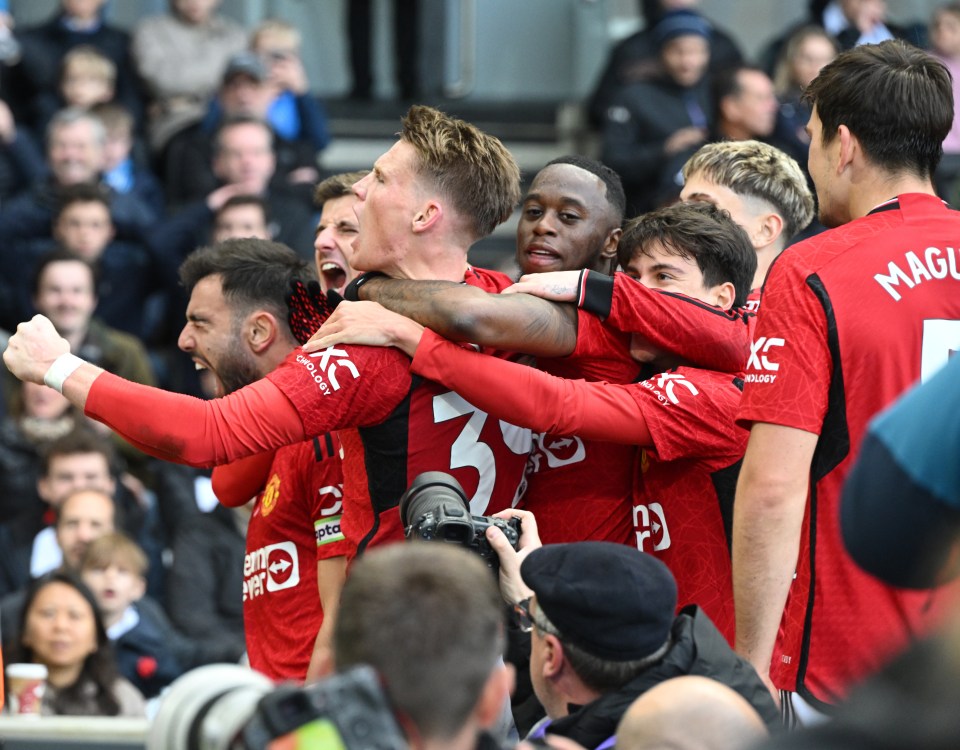 The Red Devils players celebrated the last-gasp winner