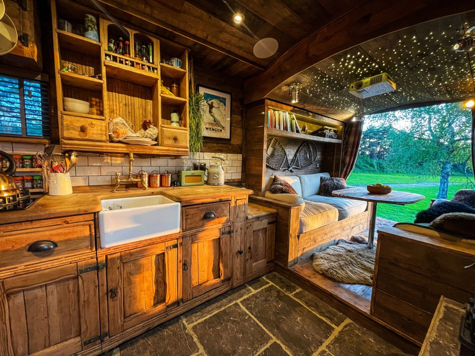 The converted motorhome comes with a lounge, dining room, bedroom, and bathroom