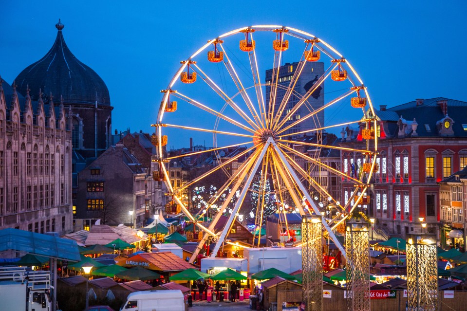 A ferris wheel overlooking the market