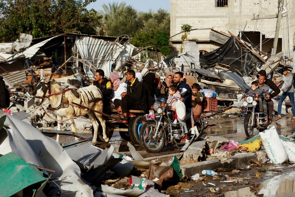 The torn city has been destroyed by deadly airstrikes as residents are being urged to leave before fighting starts up again