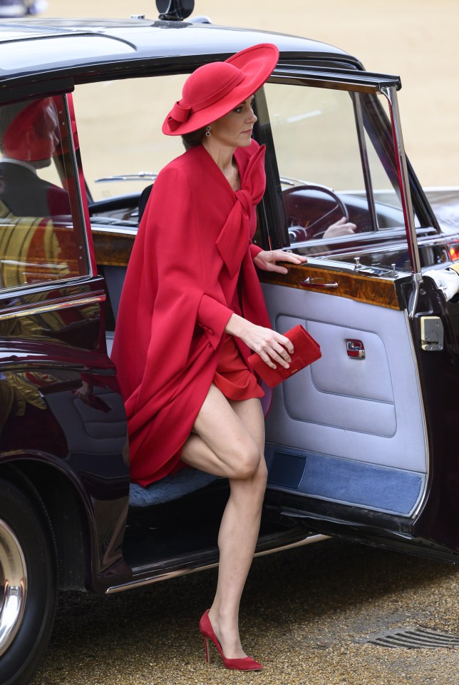 Kate earlier wore a £3,000 red cape and a pair of Princess Diana’s sapphire and diamond oval drop earrings at Horse Guards Parade for the ceremonial welcome