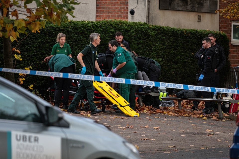 Paramedics at the scene of the double stabbing in north Manchester