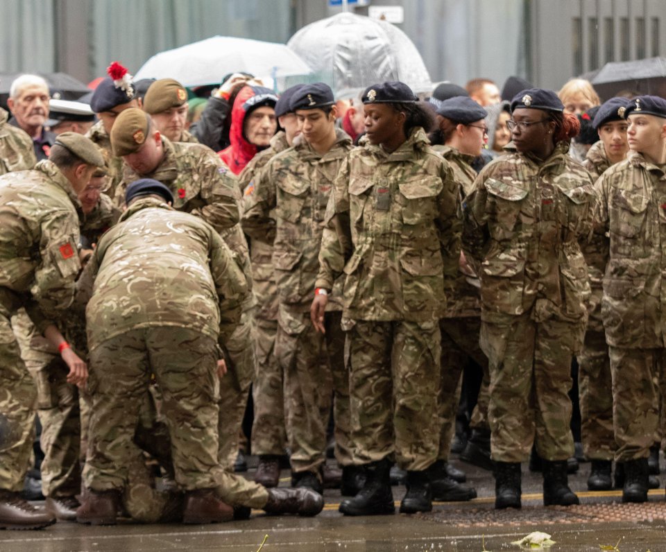 An army cadet at a service by Manchester's Cenotaph in St Peter's Square, is also understood to have fainted today