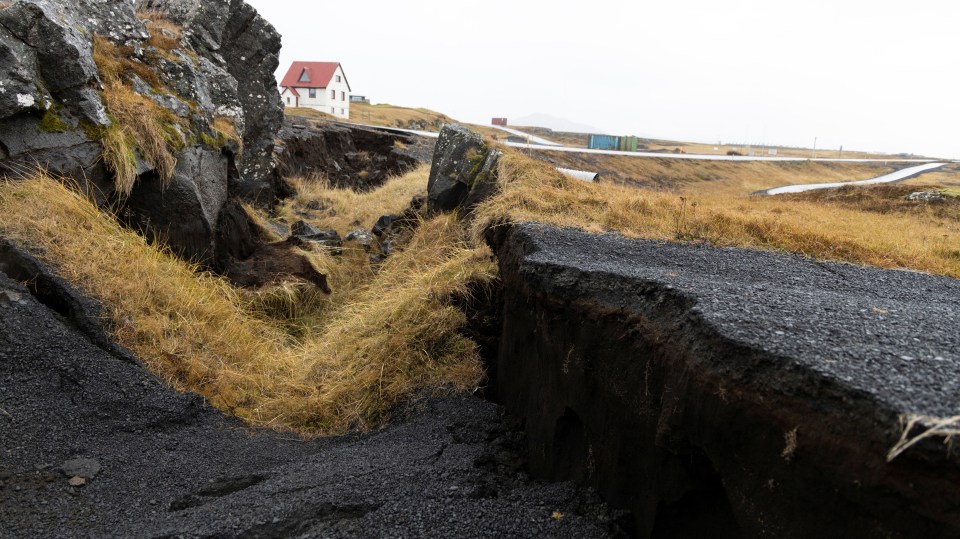 Hundreds of earthquakes have caused huge cracks in the town