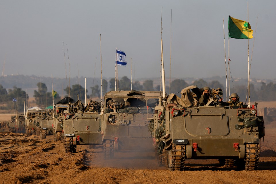 A convoy of Israeli military tanks leave Gaza as the four-day ceasefire begins