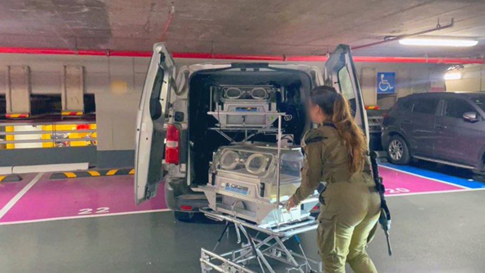 IDF troops are snapped transferring incubators from a hospital in Israel to the Shifa Hospital in Gaza