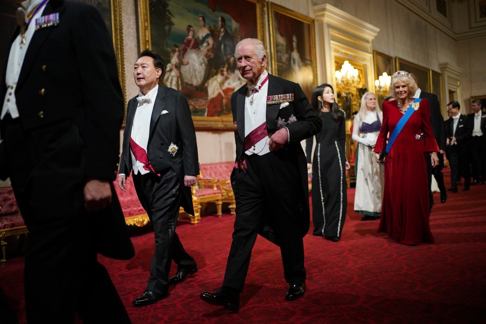 The King and president Yoon Suk Yeol lead the way to the banquet