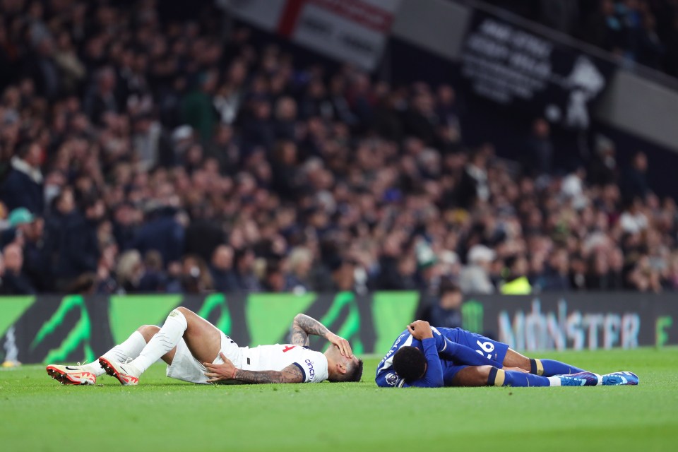 Both players lay down injured in the aftermath of the kick-out