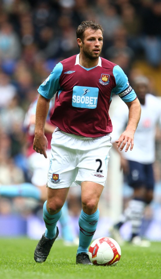 Neill in action for West Ham against Spurs in April 2009