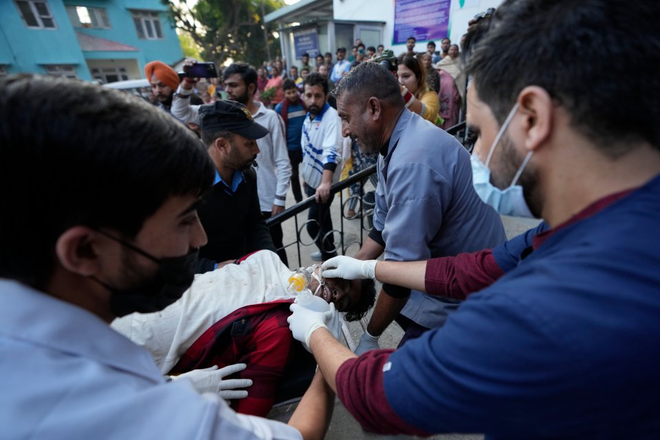 The horrifying scenes of emergency services and locals helping to transport the critically injured onto ambulances